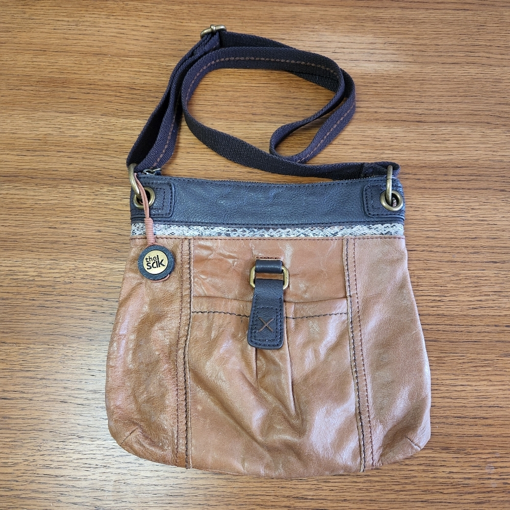 The Sak Two-Tone Leather Crossbody Bag in chocolate and camel brown.